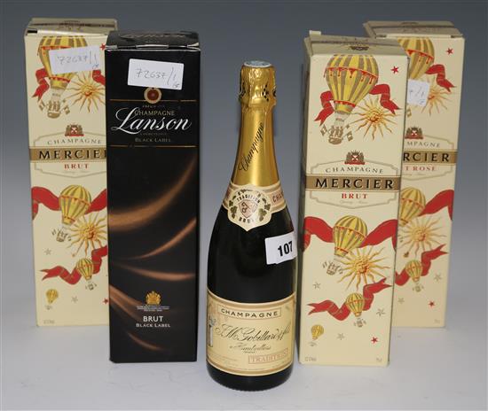 Three bottles of Mercier Brut Rose Champagnes, a bottle of Lanson Black Label Champagne and a bottle of Gobillard Champagne (5)